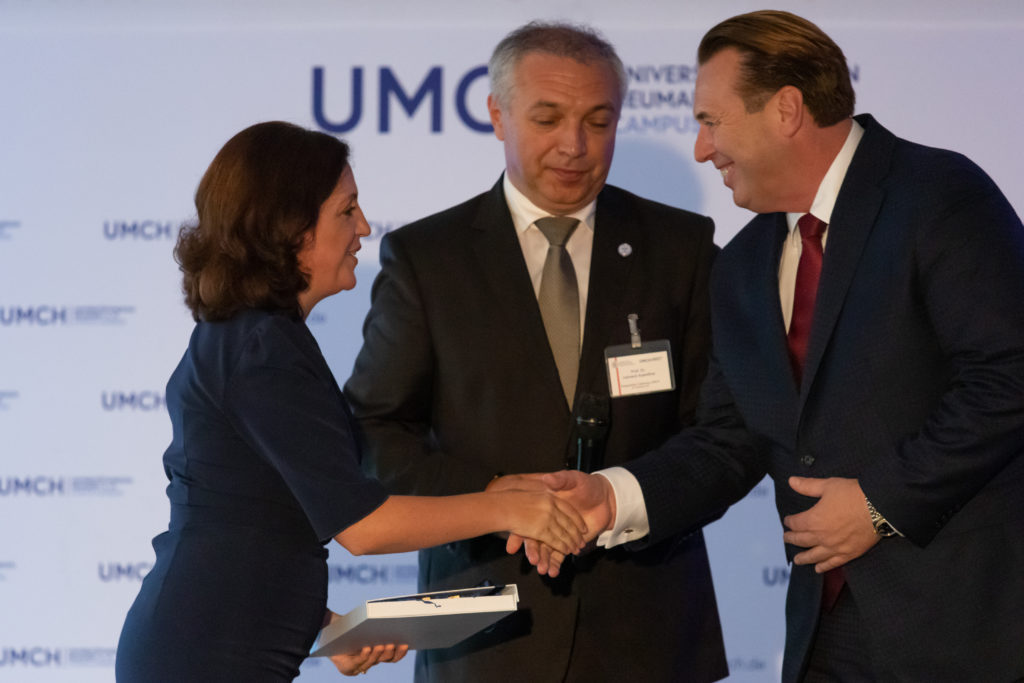 Handshake during the opening ceremony of UMCH in Hamburg